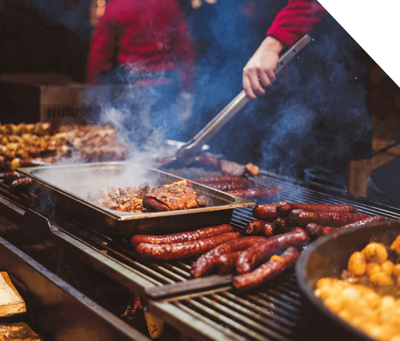 a person is making BBQ dishes